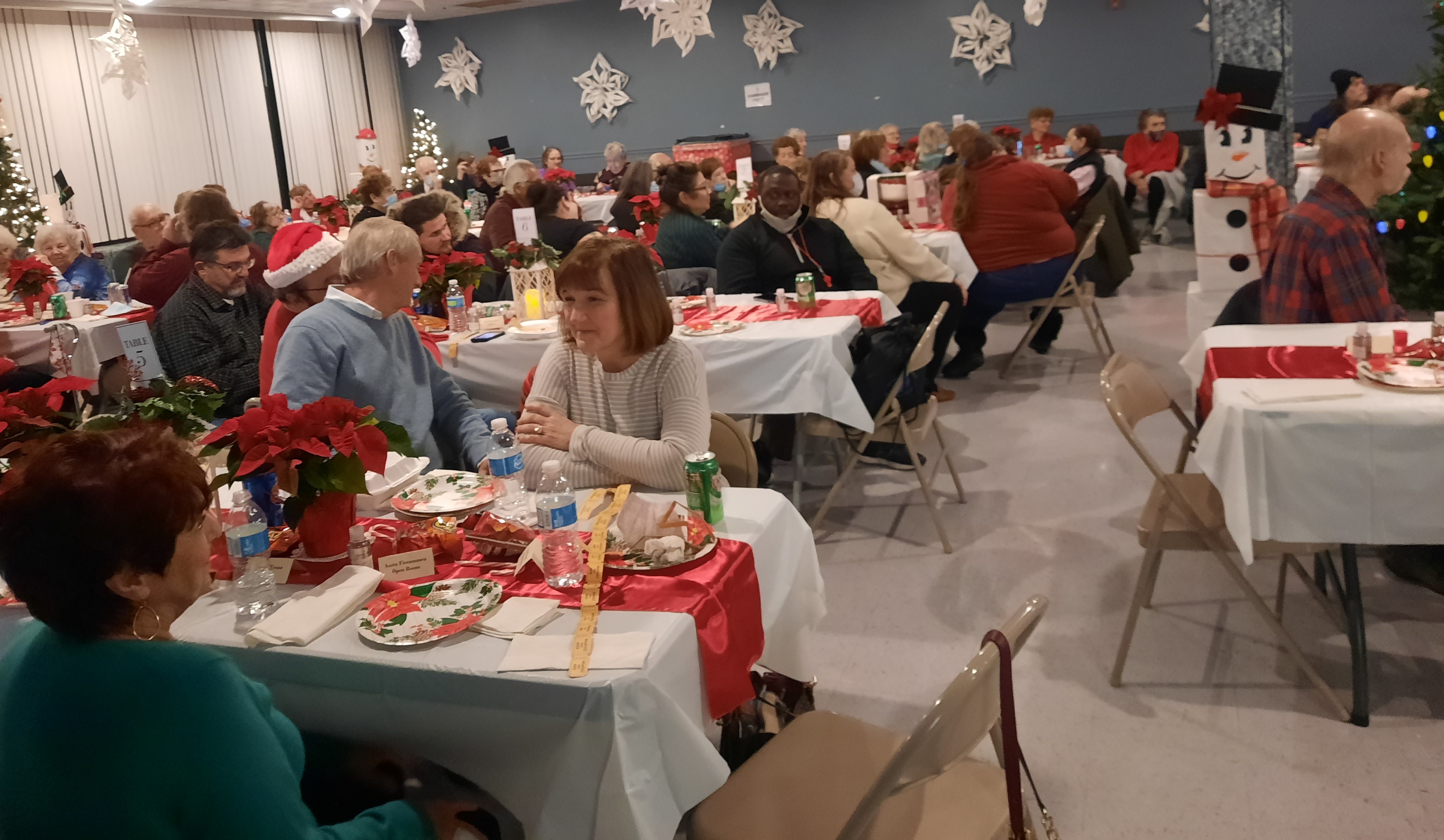 Seniors enjoying holiday dinner event